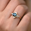 Teal Sapphire Deco Ring with Triangle Diamonds on finger.jpg