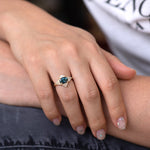 Teal Sapphire Deco Ring with Triangle Diamonds on hand