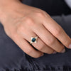 Teal Sapphire Deco Ring with Triangle Diamonds on jeans.jpg