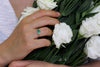 Baguette Cut Emeralds Engagement Ring On Hand