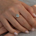 Baguette Cut Aquamarine Ring with Diamonds on Finger