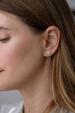 Baguette Diamond Earrings on Ear 