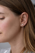 Baguette Diamond Earrings on Ear 