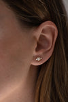 Baguette Diamond Earrings on Ear in Shadow 