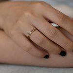 Black-Baguette-Diamond-Eternity Ring-Black-Wedding-Band-on-finger