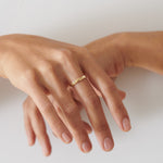    Black-Rose-Engraved-Full-Eternity-Gold-Wedding-Band-on-finger