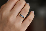 Blue Sapphire Baguette Engagement Ring On Hand