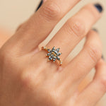 Bouquet-Engagement-Ring-with-Teal-Sapphire-and-Diamond-Petals-moments