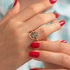 Bouquet-Engagement-Ring-with-Teal-Sapphire-and-Diamond-Petals-side-shot