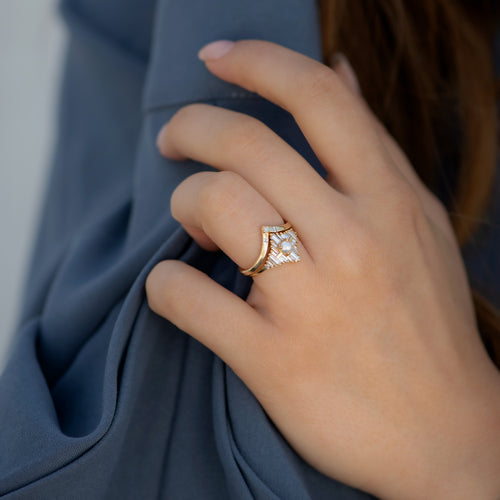 Chevron-Wedding-Ring-with-Baguette-and-Princess-Diamonds-on-finger