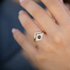 Chevron-Wedding-Ring-with-Baguette-and-Princess-Diamonds-set-on-finger