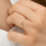 Curved-Brick-Wedding-Band-with-Brilliant-Diamonds-on-finger