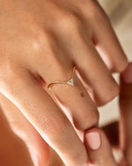 Curved-Wedding-Band-With-a-Triangle-Diamond-Peak-ON-FINGER
