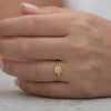 Dainty-Gold-Flower-Ring-Seed-Pearl-Ring-top-shot-on-finger