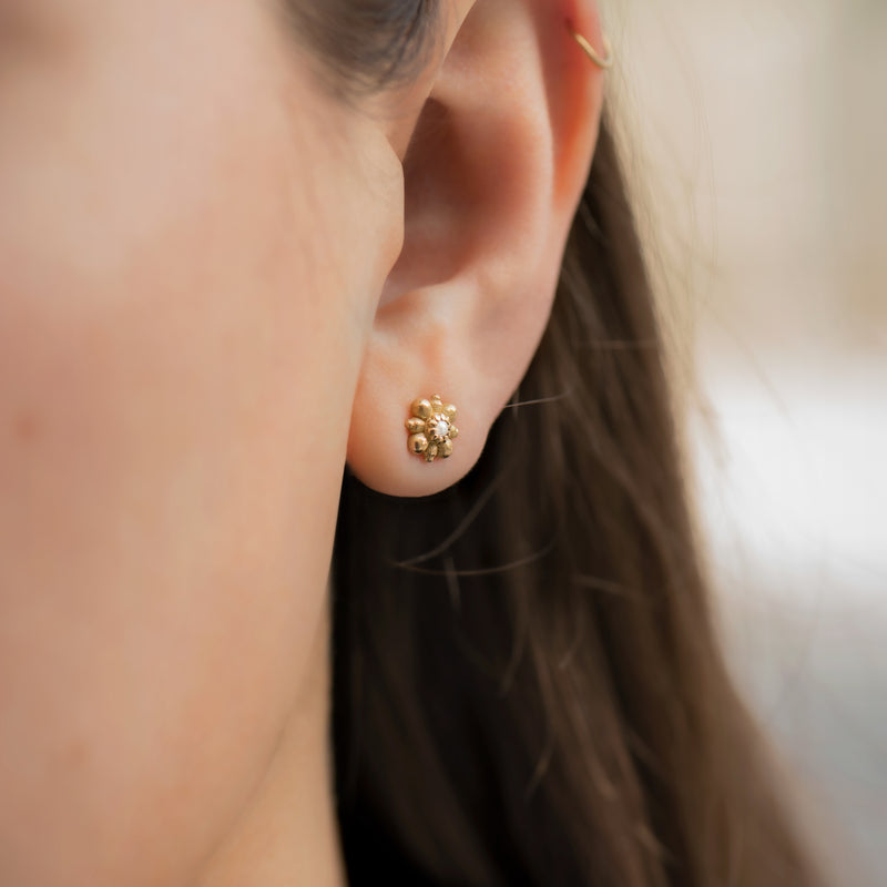 Dainty-Gold-Flower-Stud-Earrings-with-White-Seed-Pearl-side-shot