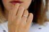 Diamond Cluster Engagement Ring On Ring Finger