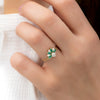 Emerald-and-Diamond-Cluster-Engagement-Ring-angle