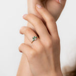 Emerald-and-Diamond-Cluster-Engagement-Ring-sparking