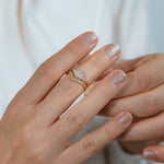 Engagement-Ring-with-a-Cluster-of-Diamonds-Small-Flora-Ring-momeny-in-set-side-shot