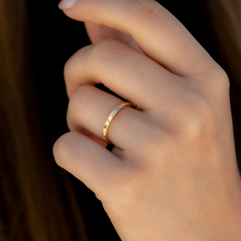 Engraved-Golden-Sun-Pattern-Wedding-Band-video-ring-on-finger