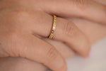 Engraved Star Diamond Wedding Band on Finger Side Shot