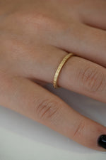 Engraved Wedding Band - Loved in Hebrew Up Close on Hand 