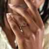 Flowers-of-Evil-Red-Garnet-_-Black-Diamond-Engagement-Ring-on-finger