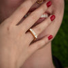 Framed-Horizontal-Engagement-Ring-with-Half-Moon-and-Baguette-Diamonds-side-shot