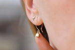 Front View Of Tiny Cube Gold Earrings