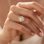 Gentle-Wave-Baguette-Diamond-Engagement-Ring-on-finger