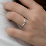 Geometric-Engagement-Ring-with-OOAK-Arrow-Diamonds-on-finger