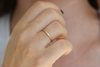 Minimalist Wedding Ring On Finger