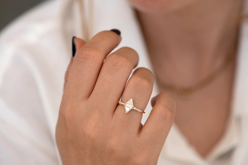 Geometric Engagement Ring with Triangle and Baguette Diamonds on Hand front view 