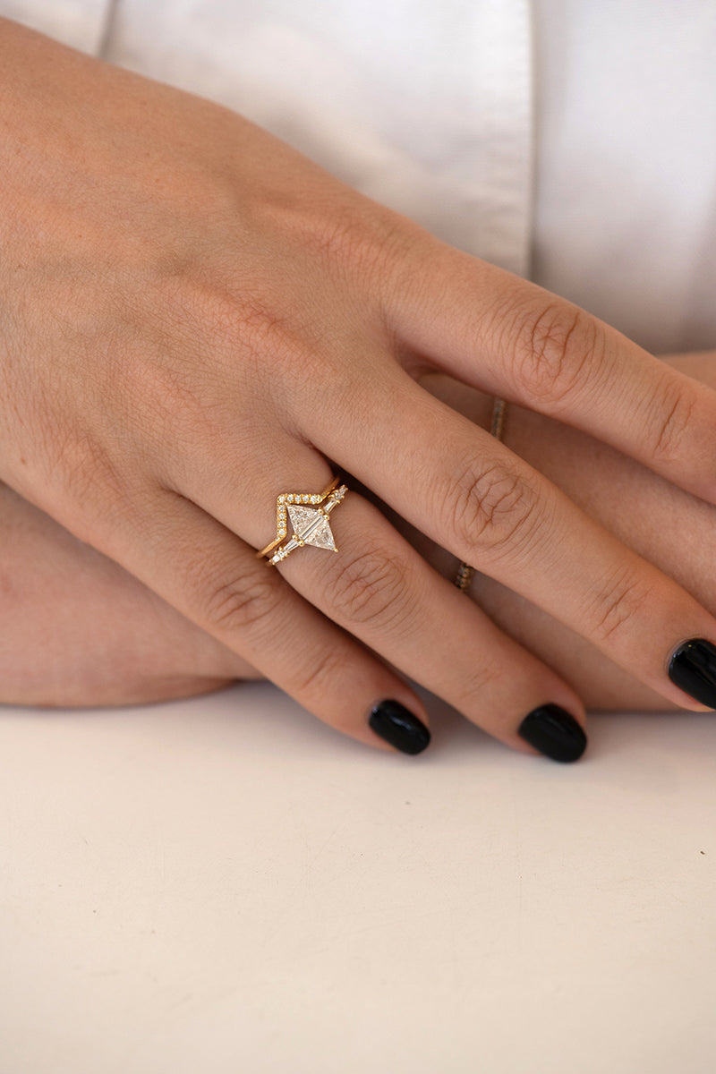 Geometric Engagement Ring with Triangle and Baguette Diamonds on Hand in set front shot 