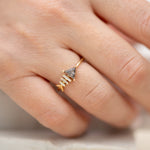 Gold-Fish-Bone-Ring-with-Triangle-and-Baguette-Cut-Diamond-on-finger