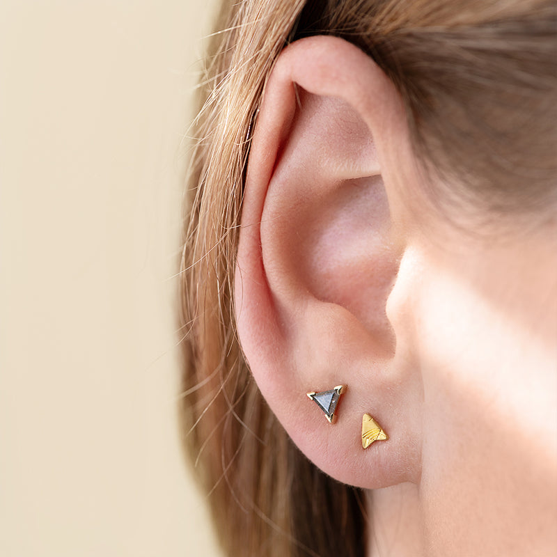 Gold Stud Earring - Arrow Earring on Ear in Light 