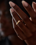       Golden-Chevron-Wide-Wedding-Band-on-finger