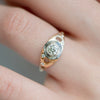 Golden-Grommet-Ring-with-a-Fancy-Green-Diamond-and-Grey-diamond-Sphere-top-shot