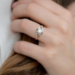 Golden-Grommet-Ring-with-a-Fancy-Green-Diamond-and-Grey-diamond-on-finger