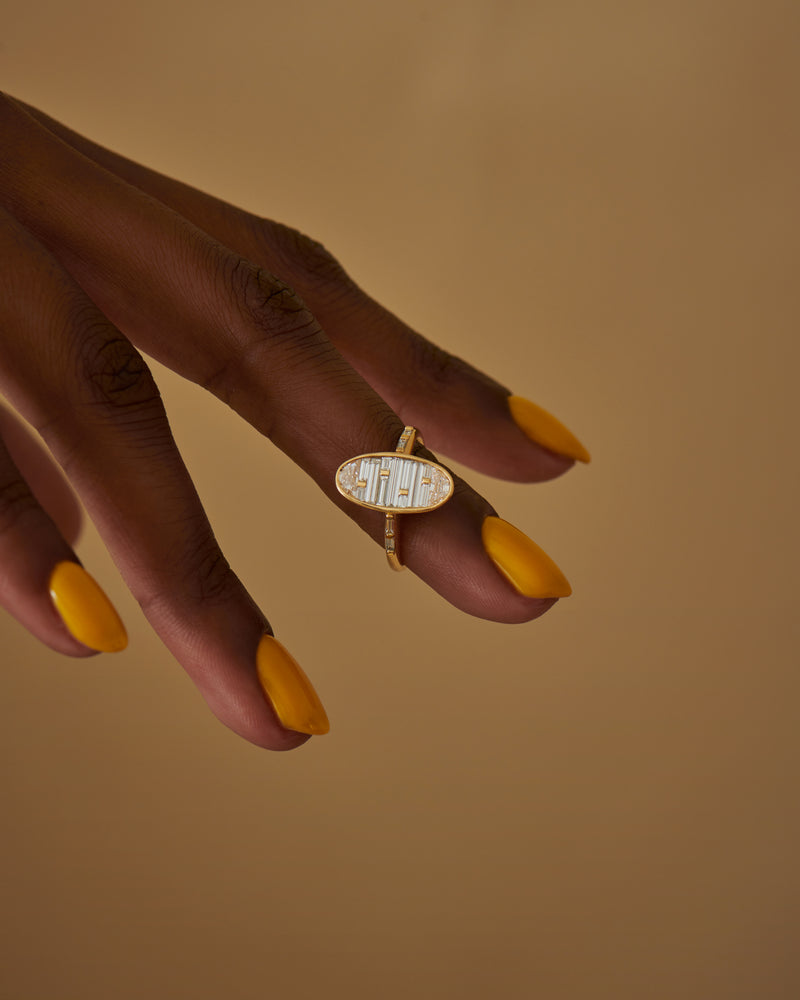 Golden-Vessel-Engagement-Ring-with-Half-Moon-and-Baguette-Diamonds-sparking