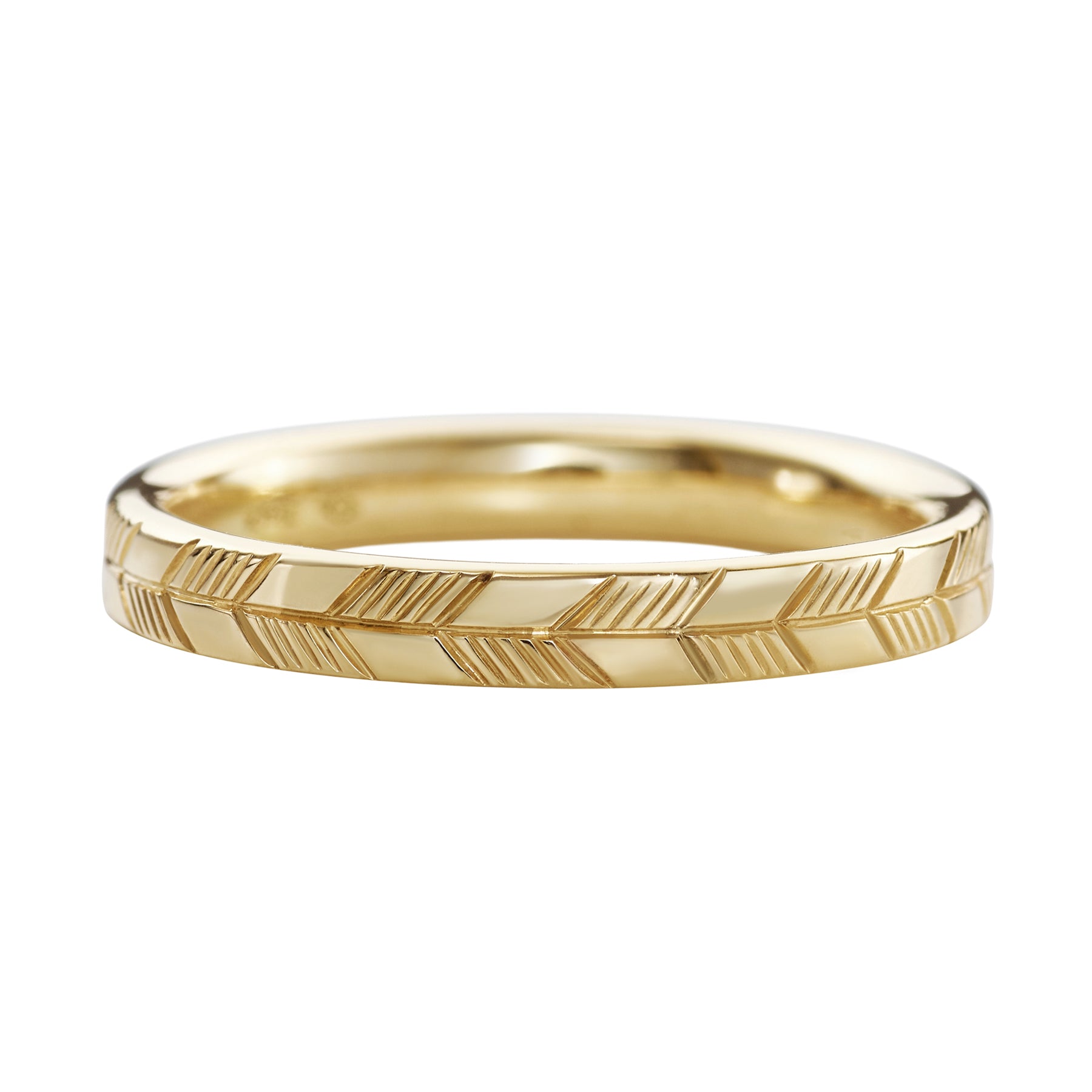    Golden-Wedding-Band-with-an-Abstract-Feather-Engraving-CLOSEUP