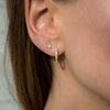 Goldfish-Diamond-Studs-Earrings-with-Pear-Cut-Diamonds-closeup-moment