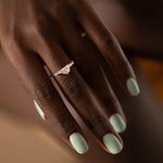Half-Moon-Diamond-Ring-with-Tapered-Baguette-Beams-on-finger