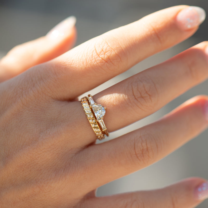 Half-Moon-Diamond-Ring-with-Tapered-Baguette-Beams-sparking