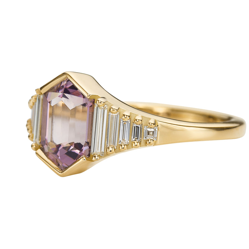 Lilac-Engagement-Ring-with-an-Elongated-Hexagon-Spinel-and-Baguette-Diamonds-side-closeup