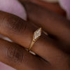 Lozenge-Cut-Diamond-Engagement-Ring-with-a-Golden-Bezel-angle