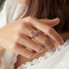 Lyra-OOAK-Purple-Spinel-_-Baguette-Diamond-Engagement-Ring-on-finger