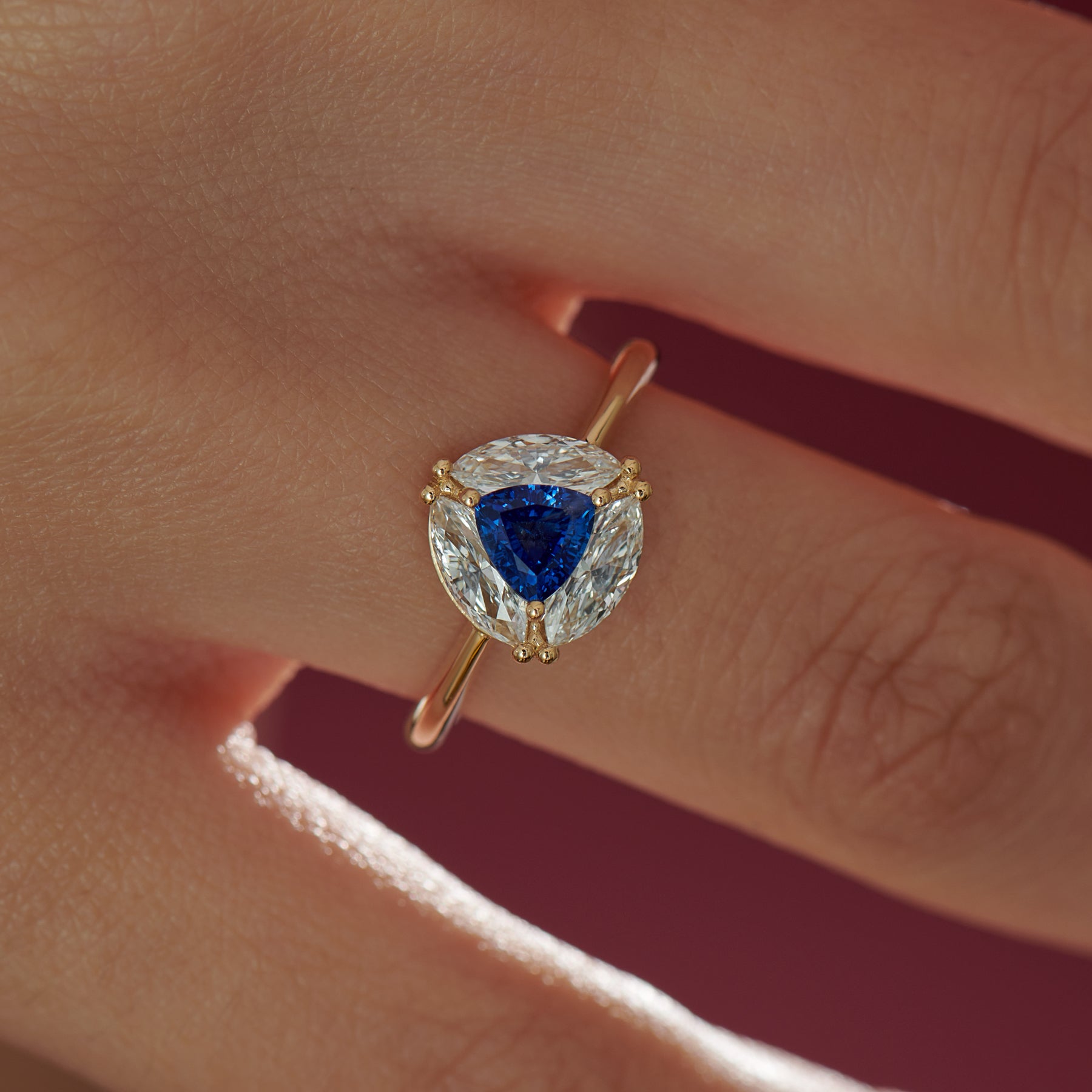 Marquise-Diamond-and-Royal-Blue-Trillion-Sapphire-Engagement-Ring-top-shot