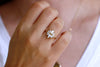 Marquise cut Diamond Cluster Engagement Ring On Finger