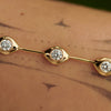    Minimalist-Daisy-Chain-Gold-Bracelet-with-White-Diamonds-TOP-SHOT